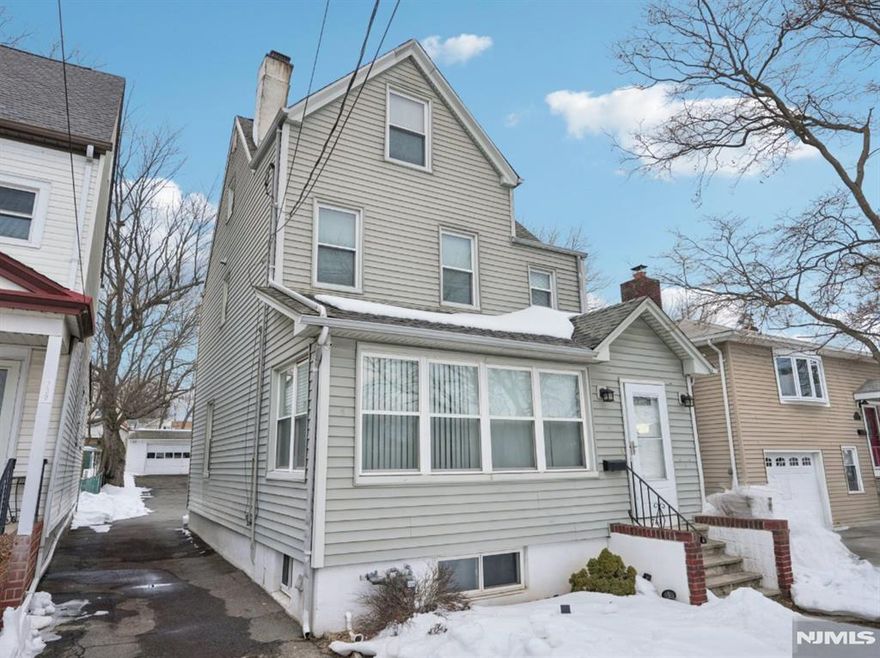 Welcome to this spacious 4-bedroom, 1.5-bath Nutley gem! Completely renovated down to the studs in 2006, this home features modern peace of mind with a newer gas boiler and water heater (4 years old). The exterior is a true standout, boasting a large driveway and rare 2-car garage. The location is unparalleled for convenience: you are directly across from a beautiful park and the Hackensack Meridian School of Medicine, with the Ralph Lauren offices just a short distance away. Commuting is effortless with NJ Transit bus stops located right at the corner of The Oakley and along Route 3. Best of all, you are minutes away from premier shopping and dining at the Promenade Shops at Clifton and Clifton Commons, featuring a variety of restaurants, boutiques, and entertainment. This is the perfect turn-key home in a prime, vibrant location! Sold as-is.