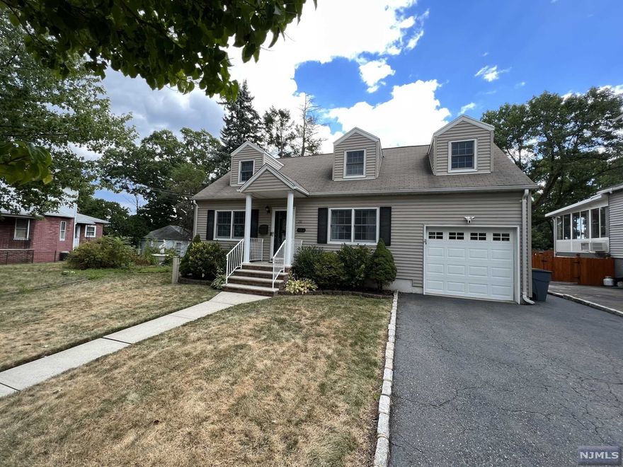Highest & Best Due Mon 10/03 @ 5 PM. Location Location Location! Move in ready custom Cape/Colonial w/ new kitchen, granite island, ceramic tiles, separate dining area. First floor also offers one full bath, hardwood floors, dining room and a sunroom overlooking the backyard. 2 bedrooms + office or walk-in closet or 3rd captive bedroom on second floor, a 2nd full bath. Finished basement with rec room, storage and utility room. 1 Car Garage ready with NEMA 240V electric car charger. Private backyard w/ deck, patio, shed, fence, and private landscapes. Property also features central air, sprinkler system. Easy access to NY/NJ bus at end of street. Close to schools, medical school, and major highways.