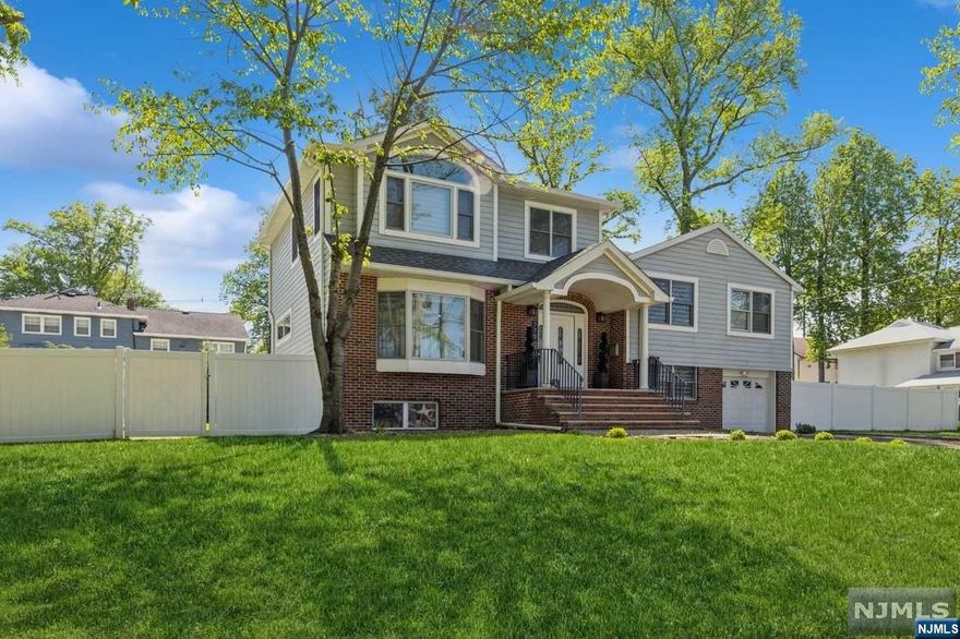 Welcome to your serene retreat! This inviting split-level home features four bedrooms, two baths, and an open layout that seamlessly connects the living room, kitchen, and dining room. Whether you're hosting a dinner party or enjoying a cozy movie night, this versatile space caters to your every need. The ground floor offers flexibility for a relaxed family room or a dedicated office, adapting to suit your unique lifestyle. It boasts four spacious bedrooms, including a luxurious primary suite with an en-suite bathroom and two walk-in closets. Each bedroom offers ample space for rest and rejuvenation. Step outside and enjoy your private yard, perfect for outdoor activities and creating cherished memories. Conveniently located near amenities, parks, schools, and shopping, this remarkable home invites you to embrace tranquility and create lifelong memories.