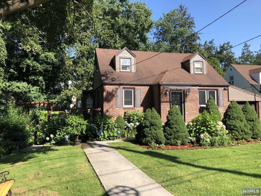 COMMUTER'S DREAM COME TRUE !!!! EXPRESS BUS TO NYC 41 ST STREET PA TERMINAL. UPDATED HOME FEATUING AN ENTRY FOYER, A LARGE LIVING ROOM WITH AN ADJACENT DEN/HOME OFFICE OR DAY ROOM,DINING ROOM, KITCHEN AND FULL BATH COMPRISES FIRST FLOOR. SECOND FLOOR CONTAINS A LARGE PRIMARY BEDROOM, SECOND BEDROOM AND FULL BATH. BASEMENT IS FINISHED WITH UTILITY ROOM AND LAUNDRY. ONE CAR GARAGE. DECK AND GREAT BACKYARD COMPLIMENTS THIS HOME. THIS HOME IS WALKING DISTANCE TO LEONIA'S PARKS AND SCHOOLS. OVERPECK COUNTY PARK IS CLOSEBY OFFERING JOGGING AND RUNNING TRACK AND RIDING STABLES. LEONIA OFFERS AYSO SOCCER, SOFTBALL, BASEBALL, TENNIS AND VOLLEYBALL THROUGH RECERATIONAL PROGRAM AS WELL AS OTHER PROGRAMS FOR BOTH ADULTS AND CHILDREN AND OLYMPIC SIZE MUNICIPAL POOL FOR TOWN RESIDENTS. YOU HAVE ACCESS TO 95 NORTH AND SOUTH, 80 WEST AND RTS 4 AND 46 AND 9W CORPORATE OFFICES AND THE PALISADES PARKWAY NORTH TO HUDSON VALEY CORP OFFICES.BUILDING DEPART APPL NEEDED TO REGAIN 3 BEDROOM STATUS.