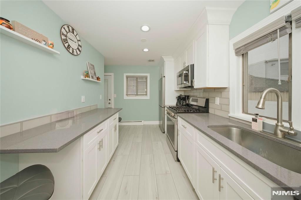 Photo of 130 Tuella Avenue, Elmwood Park, NJ 07407 (MLS # 26006912)