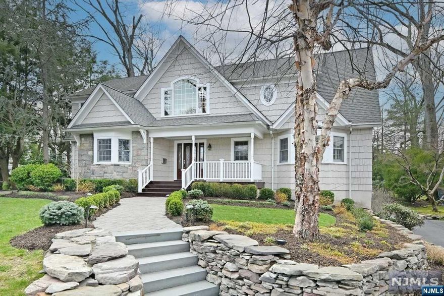 Masterfully designed & renovated and in a top Willard School area location, this 3,827 square foot, 5 bedroom, 4 1/2 bath residence has the sought-after open floor plan concept that will wow you. Welcomed by an open porch with mahogany flooring, it opens to a 2-story entrance foyer. The living room has built-ins & fireplace. Formal DR. The great room & gourmet kitchen overlook the paver patio, outdoor cooking station, manicured lawn & gardens. Stunning 1st fl primary BR suite features an outstanding bathroom with both tub & shower & a spacious dressing room/WIC plus exceptional home office. 2nd fl with 3 bedrooms, 2 baths, 2nd laundry room & 2 upper foyer sitting areas. Finished lower level opens to grade offering a large office/BR with private outside entrance, full bath, mud room, playroom with fireplace, Ldy & access to the attached 4-car garage wired for EV charger. WHOLE HOUSE GENERATOR. Don't miss seeing this gorgeous residence.