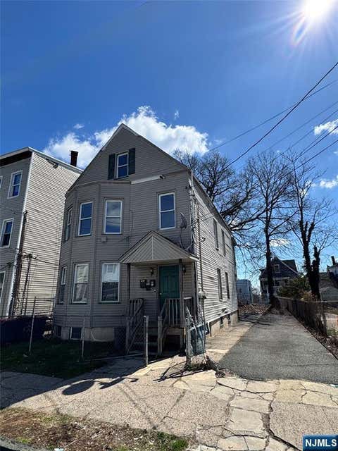 Photo of 8890 6th Street, Paterson, NJ 07522 (MLS # 26012489)