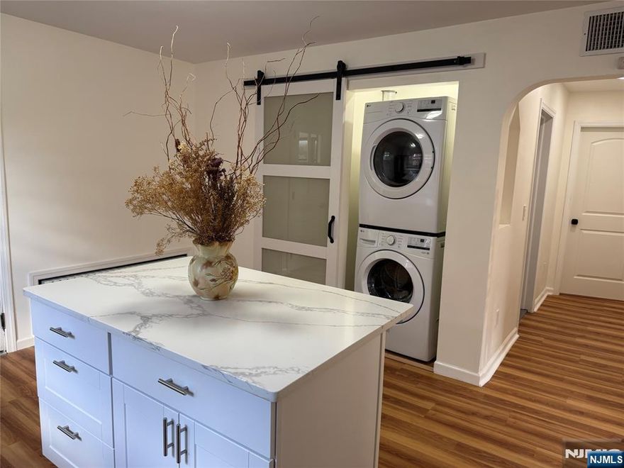 Discover your perfect home! This charming 2-bedroom apartment features a beautifully renovated kitchen and bathroom, a convenient washer and dryer in unit, and one dedicated driveway parking spot. All utilities included. Ideal for anyone seeking comfort and convenience in a great location. Donâ€™t miss outâ€”schedule a viewing today! Text 201-695-4433. Landlord wants no more then two people in the unit!.