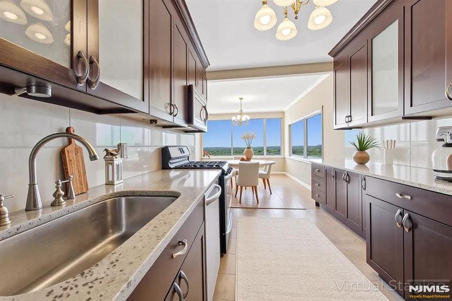 Discover the perfect blend of suburban ease and city sophistication in this expansive 3-bedroom, 2.5-bath co-op, offering approx. 2,125 sq. ft. of single-level livingâ€”with utilities, taxes, amenities, and indoor parking all included. Designed as a ranch-style home in the sky, this sunlit residence features floor-to-ceiling windows and two enclosed terraces, capturing stunning east-facing views of the Hudson River, NYC skyline, and George Washington Bridge. The flowing layout is ideal for both relaxation and entertaining, with an updated kitchen, formal dining room, and spacious living areas. The primary suite is a true retreat, offering a private enclosed terrace, en-suite bath, and dressing area. Additional highlights include hardwood floors, crown moldings, and generous closet space throughout. TOTAL FEES $3629.79(MAINT $3264.17,INDOOR PARKING $96,CAP ASSESS $201.25,CBL/INT $68.37) Board approval required 4:1 Income to Debt Ratio. All cash purchase requires min gross income of $174k w/no other debt. *Some photos virtually staged