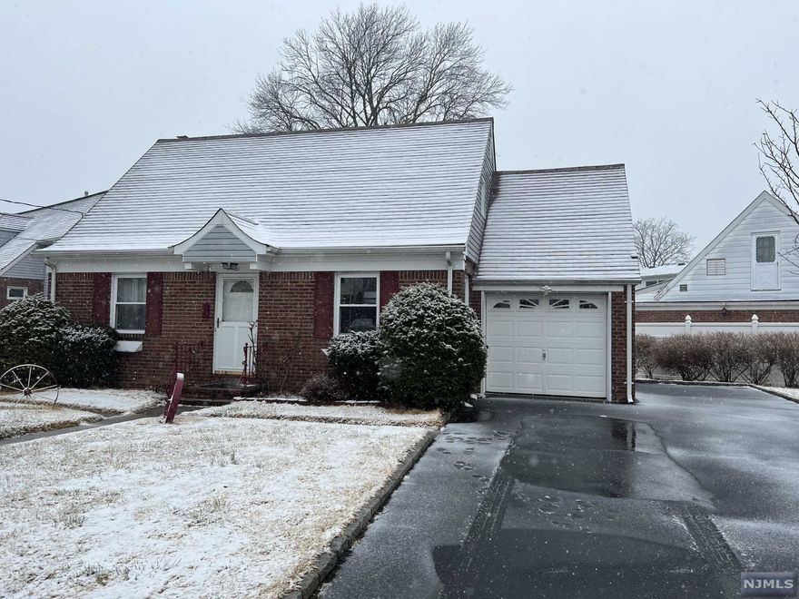 Charming cape on a quiet street. One car garage attached. Approx 10 year old roof. Hardwood floors. Newer windows. Forced hot air heat. Could easily add central air. First floor has living room, eat in kitchen, two bedrooms and full bath. Second floor has a large bedroom. Basement is full, partially finished with recreation room, laundry and utilities. Sold as is.