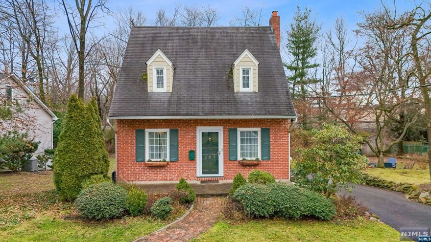 Welcome to this enchanting colonial nestled in the sought-after neighborhood of Glen Rock! Adored by its current owners, who had never planned to part w/ their beloved residence, this impeccably maintained property is being placed on the market due to a relocation. Step inside to discover a formal living room w/ wood-burning fireplace, dining room w/ built-in corner cabinet bringing a touch of traditional elegance, and a bright kitchen that flows into the expanded section of the house that includes a sunlit family room featuring sliding doors leading to a trex deck, creating the perfect balance of timeless charm and contemporary lifestyle. A conveniently located powder room completes this floor. On the 2nd level you will find a primary suite w/ a stunning bathroom and walk-in closet, 2 extra bedrooms and a brand new hall bathroom. The finished basement will surprise you w/ a rec room, cleverly designed hidden storage areas, and a spacious laundry room with access to the garage.