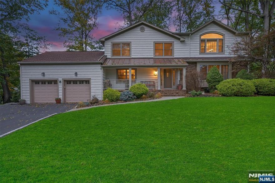 Welcome to this wonderful 4/5 bedroom, 3 1/2 half bathroom colonial nestled on a private cul-de-sac in Northern River Vale.The inviting lemonade porch welcomes you into this beautiful home.Grand living room flows seamlessly into the formal dining room, perfect for entertaining!The chefâ€™s kitchen features a 6 burner Thermador oven, stainless steel appliances,wine frig,granite counter tops and custom cabinets.Sun-drenched family room w/wood burning fireplace & custom bar area.Sliders to the outdoor space w/a large paver patio & private backyard w/gorgeous lush landscaping.A guest room/home office,powder room & laundry room w/laundry chute complete the main level. The upper level boasts a gorgeous HUGE primary bedroom suite with a gas fireplace,2 custom walk-in closets & lux primary bathroom w/a tub, double sinks, make-up area & a large stall shower. 3 additional generously sized bedrooms, one of the bedrooms is ensuite with a walk-in closet, plus another full bathroom complete the second level. The finished lower level is the perfect play/rec room, it features a built-in desk area for a home office, gym space, huge storage room, plus lots of closets. So many upgrades throughout this home, whole house generator, gleaming hardwood floors, new central ac, alarm system, belgium block driveway, sprinklers and the whole house freshly painted. Just minutes from parks, shopping, dining & NYC transportation. Busing to the middle and high school! This home shows true pride of ownership