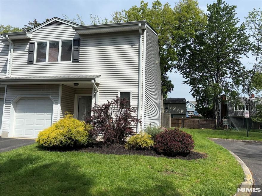 Truly a rare opportunity, End unit at the end of the complex. Ground level has a one car garage, powder room, kitchen, dining area, living room with sliders to a patio. Upper level has two bedrooms, full bath, laundry, primary bedroom with a full bath. Storage attic. Sold as is. for further information, please text or call the listing agent at 201-566-5353