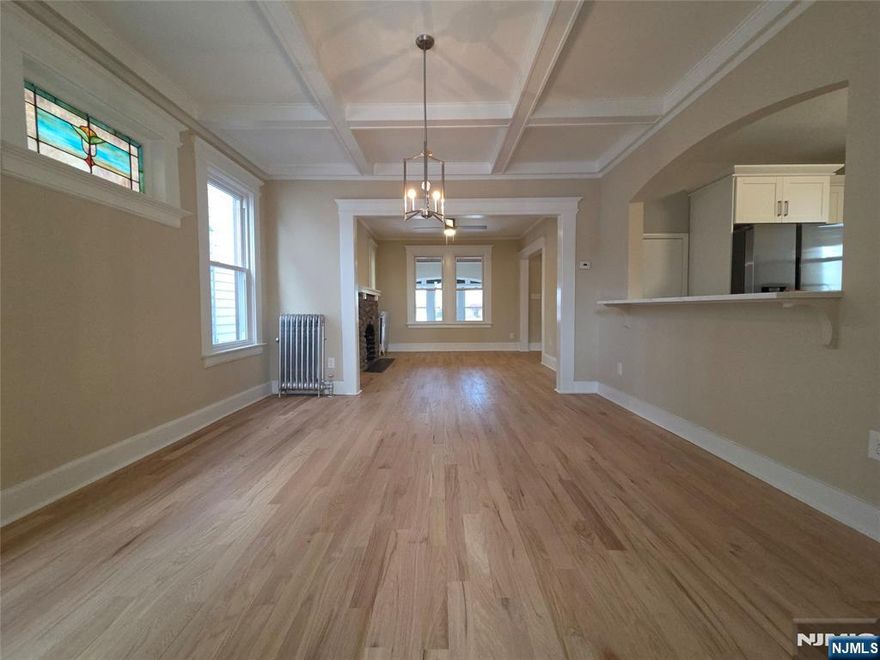 Beautiful large and remodeled colonial with many updates such as brand new windows(except 3), brand new kitchen w/ new appliances and baths, brand new 3/4 in oak hardwood flooring, new steps and so much more!!! First floor offers a beautiful open porch for those beautiful days and nights, Beautiful large entry foyer, open living room and a formal dining room with gorgeous ceiling, additional back room poss office or workout room, beautiful new kitchen w breakfast counter open to dining room/glass backsplash/quartz counters and pantry w slide out drawers and new s/s appliances, new powder room and a rear mud room to yard!! Second floor beautiful bright primary bedroom with window seats,2 additional bedrooms, new bath and walk up stairs to large attic with 2 more potential bedrooms!!! Basement full partially finished & freshly painted with yard access, multi purp rm, laundry & utility room....nice size yard and 1 car detached garage with painted floor and new door/roof and window!! Nothing to do but move in and walking distance to school,shopping,parks and transportation!!!! Will not Last !!!