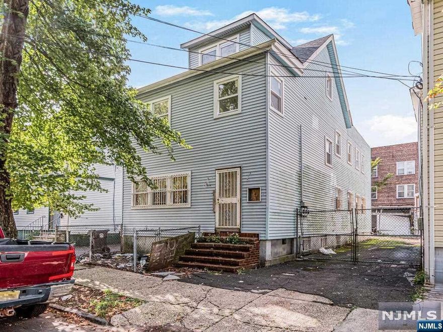 This is a 2 family investment opportunity in Newark. This property has been fully sheet rocked and ready for completing your final touches. Once done; this property will have good amount of equity since renovated homes go above $600k. All new electrical and all baths have been tiled. Plans are available too! Features a 3 bed / 2 bath on the first floor & a 5 bed / 2 bath duplex on the 2nd floor. Includes an unfinished basement + private driveway with garage. Close commute to NYC, Newark airport, highways and public transportation. Won't last!