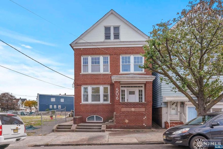 Discover the blend of historic charm and modern elegance in this vacant, meticulously renovated three-family home in Bayonne. Offering 9 bedrooms and 3 full bathrooms, this property presents a unique investment opportunity or an ideal setup for multi-generational living. Each unit unfolds a bright, open layout adorned with sleek hardwood flooring and modern fixtures. Updated kitchens boast contemporary appliances and stylish countertops, representing a harmonious merge of the home's early 20th-century heritage with modern aesthetics. Nestled in a lively neighborhood, enjoy close proximity to local shops, restaurants, and reputable schools like Bayonne High School, Holy Family Academy, and All Saints Catholic Academy. Although parking is not provided, the excellent location ensures convenient access to public transportation and a short commute to New York City. Seize the chance to own or invest in this vacant, charming three-family home amidst Bayonne's evolving landscape.