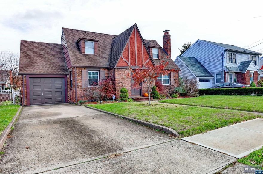 From the moment you arrive, you'll fall in love! Heartwarming curb appeal...inviting living room...wood burning fireplace...updated large eat-in kitchen...hardwood floors throughout...updated bathroom...newer windows...2nd floor primary bedroom + 2 WIC's...extra storage above garage with access from primary bedroom...beautiful large basement family room...recessed lighting throughout...newer laundry room...AC/Heat/HW heater - 2019...fenced-in backyard...just unpack and move in!