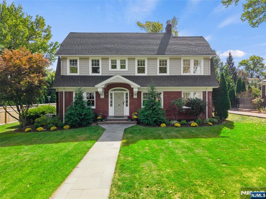 Welcome to 62 Glenwood Road in Upper Montclair, where all you have to do is unpack and move in! Nestled on one of Montclair's most coveted streets, this classic Center Hall Colonial with deep crown molding, offers 3 floors of spacious living just moments from Up. Montclair Village, shopping, dining, 2 Midtown Direct train stations, and major highways. The first floor boasts a gorgeous chef's kitchen with premium stainless-steel appliances including a Miele dishwasher, Wolf stove, and Sub-Zero refrigerator. A bright dining room with wainscoting flows seamlessly into the inviting living room with gas fireplace, opening to a sun-filled family room for added living space. A convenient powder room completes the 1st floor. Upstairs, the serene primary suite features an updated full bath and a private sitting room. Two additional bedrooms and full bath with soaking tub and large stall shower complete the second floor. The third floor offers two more bedrooms, another full bath, and attic storage. Basement includes laundry and direct outdoor access. Outside, enjoy a large patio, spacious backyard, and storage shed, perfect for entertaining or play. A detached 2-car garage and long driveway provide ample parking. Pella architect series wood windows, 2 zone HVAC, whole house generator, Central Vacuum, 10 zone sprinkler system and MORE UPDATES! This beautifully maintained home combines elegance, comfort, and convenience in one of Montclair's most desirable locations don't miss it!