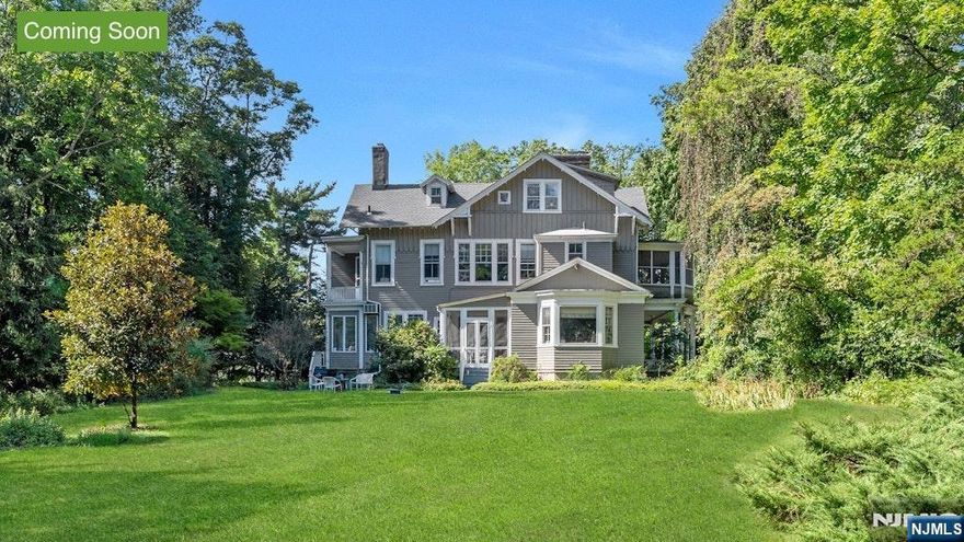 Rarely available, turn of the century South facing colonial built in 1906. BEST LOCATION ON ENGLEWOOD'S EAST HILL!! High ceilings and lots of light in most rooms. Phenomenal floor plan with front to back foyer and large reception rooms on the first level. Five bedrooms and four and one half baths on the upper levels. Large third floor attic with windows. Full basement. The property is beautiful. A shy flat acre at the crest of E. Linden Ave. Home is being sold "as is".