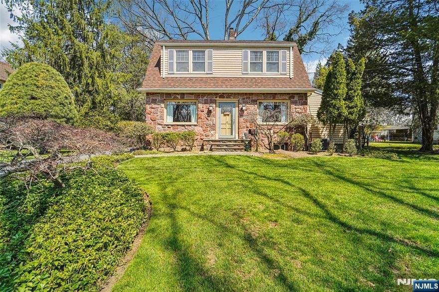 CLASSIC STORYBOOK EXTERIOR - COOL SOPHISTICATED INTERIOR. THIS CHARMINGLY COZY YET REFINED DUTCH COLONIAL OFFERING 3 BEDROOMS, 1.5 BATH IS TUCKED AWAY ON A QUIET RESIDENTIAL STREET. MAIN FLOOR OFFERS LIVING ROOM W/ GAS FPL, FORMAL DINING ROOM, LARGE EAT-IN KITCHEN W/ ACCESS TO PATIO/DECK, DEN/SITTING ROOM W/ SLIDERS TO BACK DECK & YARD, AND POWDER ROOM. SECOND FLOOR OFFERS 3 BEDROOMS AND FULL BATH. THE PART-FINISHED LOWER LEVEL OFFERS CASUAL REC ROOM, HOME OFFICE, AMPLE STORAGE, AND LAUNDRY AREA. HARDWOOD THRU-OUT. DETACHED 2 CAR GARAGE. DECK & PATIO AREA FOR OUTDOOR ENTERTAINING. LANDSCAPED YARD. AC & FURNACE -APPROX 3 YEARS. CONVENIENTLY LOCATED TO EVERYTHING