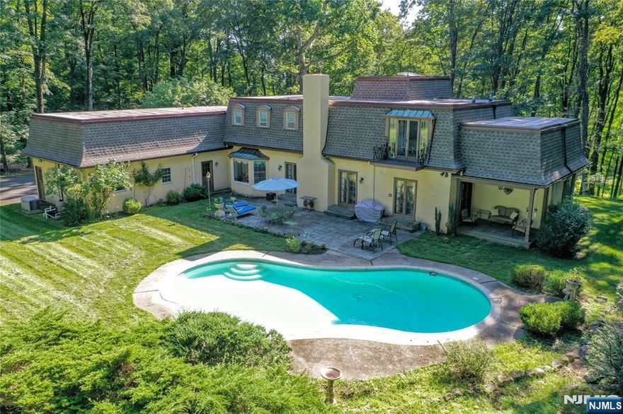 Welcome to this first time offered French country home. This charming home sits a top of a knoll with sunset views. One of a kind touches are through out the home. Enter into the marble floored entry foyer with sweeping side hall staircase. French doors through out. Great home for entertaining from the dining room to the front to back living room with lots of natural light. The library is the perfect spot to cozy up with a book or work from home. The den opens to the living room and the kitchen great space to cozy up with a warm fire and great views of the backyard. Spacious 3 car garage laundry room , full bath and 1/2 bath complete the 1st floor. The second floor landing brings you to 3 generously sized bedrooms with a full bath. The primary suite is lovely with a private balcony. Plenty of closet space and full bath. Plenty of storage and room for expansion. Bluestone patio, covered porch,and pool make this the perfect home.