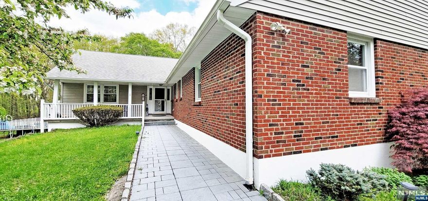 Elisa Cho and Corcoran Baer & McIntosh present "Sprawling Serenity on Paris" - Nestled on 1.92 acres, this extended, South Facing, Raised Ranch features 5 Bedrooms, (2 en suite), and 3 Full Baths and awaits your personal touch. Additional features include: 4 car garage, 2 kitchens (with potential for 3rd), Walkout Unfinished Ground Floor, Top floor Laundry, large deck, Multi-zone central a/c & baseboard heat, unfinished Walk up Attic, and above ground pool. Enjoy nature and privacy, with a golf course across the street, an equestrian stable down the road, and the county's lowest tax rate and award-winning schools (Northern Valley District). 2nd Suite Extension not a legal apartment. Home is deemed single family. 20 minutes to NYC by car. New Septic currently being installed. If you're a DIY-er or builder, new construction and renovated homes in this highly coveted historic town have sold recently at 2.5M+. Seize your chance now! Contact Elisa Cho 201.300.783