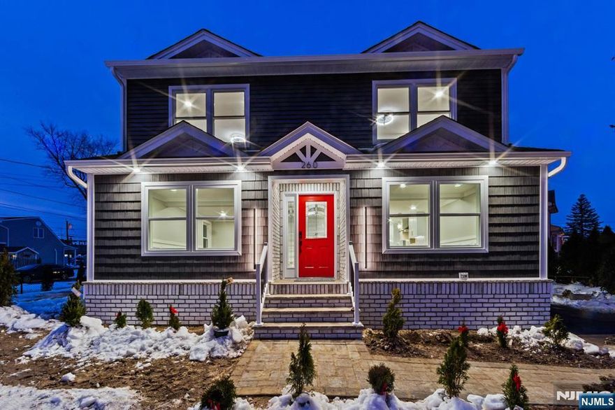 Welcome home to this truly remarkable 4-bedroom, 3.5ba bath home, completely renovated, remodeled, and expanded from the ground up. Every detail has been thoughtfully designed, with everything brand new and built to the highest standards of quality and craftsmanship. This stunning residence offers beautifully finished living space including the basement, featuring a luxurious primary suite with en-suite bath, high-end fixtures, and modern finishes throughout. The bright, open layout is perfect for everyday living and entertaining. The gourmet kitchen showcases sleek cabinetry, modern countertops, and brand-new stainless steel American-made appliances. All major systems have been upgraded, including 200 amp electrical service, providing peace of mind for years to come. Additional highlights include a full French drain system, ensuring excellent drainage and added protection, a tankless hot water heater, a spacious five-car driveway, and exceptional attention to detail inside and out. Conveniently located in Elmwood Park, close to shopping, dining, schools, and transportation, this one-of-a-kind property offers the perfect blend of luxury, comfort, and location. Schedule your private showing todayâ€”this exceptional home will not last.