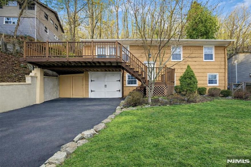 Discover a rare opportunity to own a bi-level home perched high on the Ramapo Mountains in Oaklandâ€™s sought-after Crystal Lake community. Set on 1.36 acres carved directly into the hillside, this Southeast-facing retreat captures breathtaking sunrises, sweeping mountain vistas, and tranquil views of the Ramapo River and Crystal Lake below, yet remains safely elevated and high and dry above it all. Offering approximately 2,000 sq ft of inviting living space, the home blends natural beauty with everyday comfort. The spacious bedrooms with full sized closets and well kept bathrooms offer plenty of room to grow, rest, and recharge. A wrap around deck expands your living area outdoors, perfect for morning coffee as the mountains light up or quiet evenings surrounded by nature. The propertyâ€™s natural landscape is a blank canvas waiting for your vision whether you imagine a garden, a cozy fire pit area, or a peaceful private retreat amongst the trees. A workshop garage adds great functionality for hobbies, projects, or extra storage, and the upgraded lighting plus a three year young septic system provide convenience and peace of mind. All of this sits in a tranquil yet incredibly convenient neighborhood, just minutes from Routes 287, 208, and 17 for easy access to shopping, dining, and major commutes. This Crystal Lake hillside home offers unmatched scenery, privacy, and the perfect opportunity to add your own finishing touches an everyday oasis ready to make your own