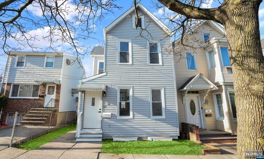 Beautiful Kearny Colonial just steps from West Hudson Park! Open concept main floor with EIK, LR, DR and Full bath. Accent Wall on stairway leads to 3 spacious full bedrooms with lots of closet space and Full bath on second floor. Basement is partially finished with half bath and room for additional rec space. Back yard has ample room for entertaining. Quick walk to Kearny Ave for shops, dining, transportation or go for a walk at beautiful West Hudson Park.