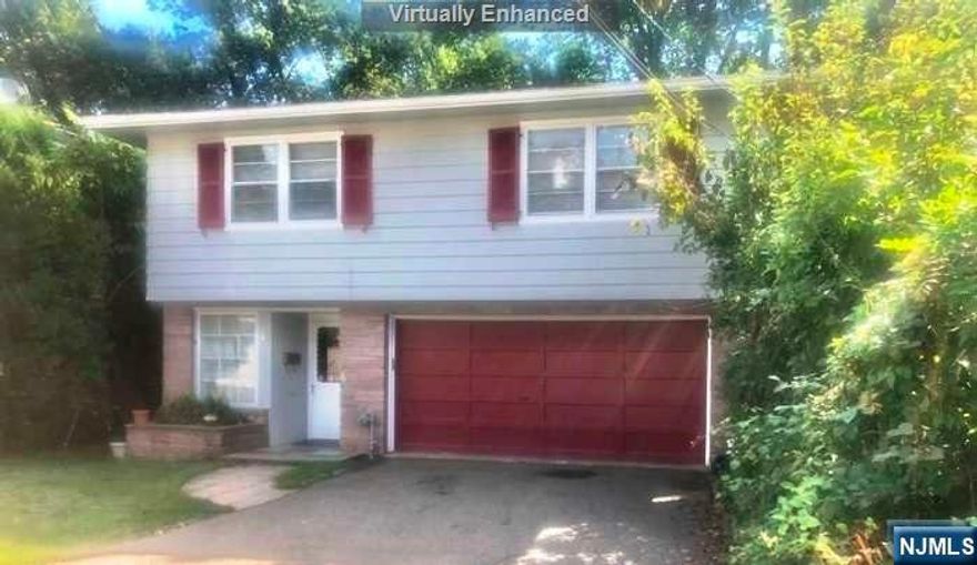 A great opportunity for buyers looking for a Mother/Daughter or Father/Son Raised Ranch with a great New York City Views. Layout is nice with bright and airy features. Great location with borders to Montclair. Close to New York Buses and Trains, shopping centers major highways and minutes to Newark Liberty International Airports. Turtle back zoo and south mountain reservations. REDUCED FOR A QUICK SALE A GREAT BUY FOR UPGRADES AND RENOVATIONS.