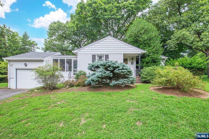 Charming ranch on an oversized corner lot in the Dogwood Section of Oakland! This delightful home boasts a foyer, a sun-drenched eat-in kitchen w/ pantry, a spacious living room, three bedrooms, hardwood floors, a full bath, and a finished basement with an office area, work station, adorable bar area and a walk-in cedar closet! Enjoy the lovely screened porch overlooking the rear patio and expansive yard, providing plenty of room for play or future expansion. Additional features include a one-car garage, large lot, and recent updates such as a newer roof, boiler, and central air. Conveniently located to major highways, schools restaurants, and shopping.