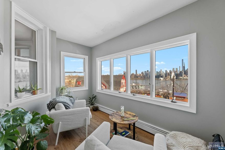 Investment opportunity with this exceptional four-family property in the heart of Weehawken. Offering spacious apartments flooded with natural light and boasting panoramic views of the iconic New York City skyline. This is an investment opportunity not to be missed on the most desired street of Blvd East. Convenient access to transportation options such as buses, ferries, and light rail, commuting to Manhattan is a breeze. Tenants will appreciate the short travel time to Midtown and Downtown NYC, allowing them to enjoy all the benefits of city living while residing in the tranquil setting of Weehawken. With its proximity to NYC and unparalleled vistas, this property promises both strong rental potential and enduring value appreciation. Short distance to shopping, dining, parks, schools and house of worship.