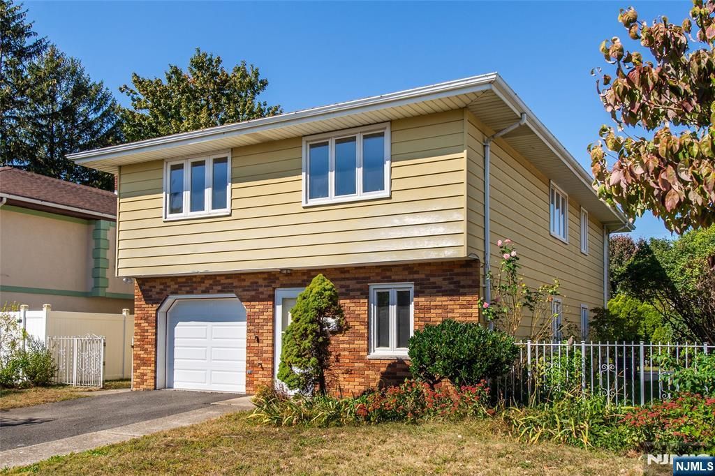 Photo of 11 Roehrs Drive, Wallington, NJ 07057 (MLS # 25035519)