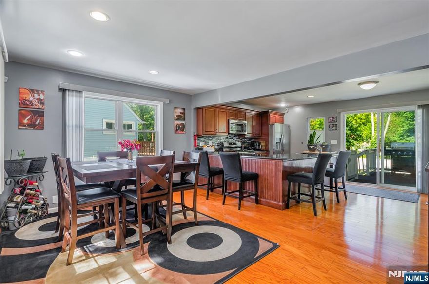 Pristine Modern Living on an Expansive Quarter Acre Land â€“ Perfect for a Relaxing Pool and Backyard Oasis! Welcome to your new Tri-Level Home showcasing Modern Living that transcends the ordinary; offering a harmonious blend of Contemporary Sophistication and Impeccable Craftsmanship throughout. 4 Bedrooms, 3 FULL Baths, Finished Basement, New Roof, New Fence, 4+ Car Parking + More! Versatile open living layout, central air, storage galore, skylights, and sun-drenched views throughout. Meticulously Maintained - reflecting a true Pride of Ownership! Inviting, new front door entrance with charming curb appeal, opens to your Grandeur Living Room with satin-finish hardwood floors and custom blinds - flows into an open Kitchen â€“ perfect for your upcoming holiday gatherings! Create culinary delights & new traditions in your Immaculate Chefâ€™s Kitchen showcasing an O-V-E-R-S-I-Z-E-D wraparound granite island, stainless steel appliances package, abundant cabinetry, gleaming hardwood floors, and recessed lighting. Sliding glass doors overlook your Private Deck and sprawling Lush Greenery â€“ perfect for seamless indoor/outdoor entertaining! Enjoy quality time with family/friends â€“ on a DEEP quarter acre lot â€“ Massive 25x14 Primary Bedroom fits a California King Size Bed + 3 additional Queen sized bedrooms, newer windows throughout, closets galore, and 3 FULL convenient Bathrooms with sleek contemporary features. Finished Basement A True Roselle Gem! Schedule Your Showing Toda