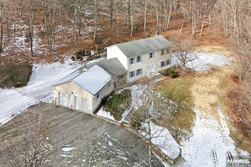 Photo of 611 Snake Den Road, West Milford, NJ 07480 (MLS # 25042749)
