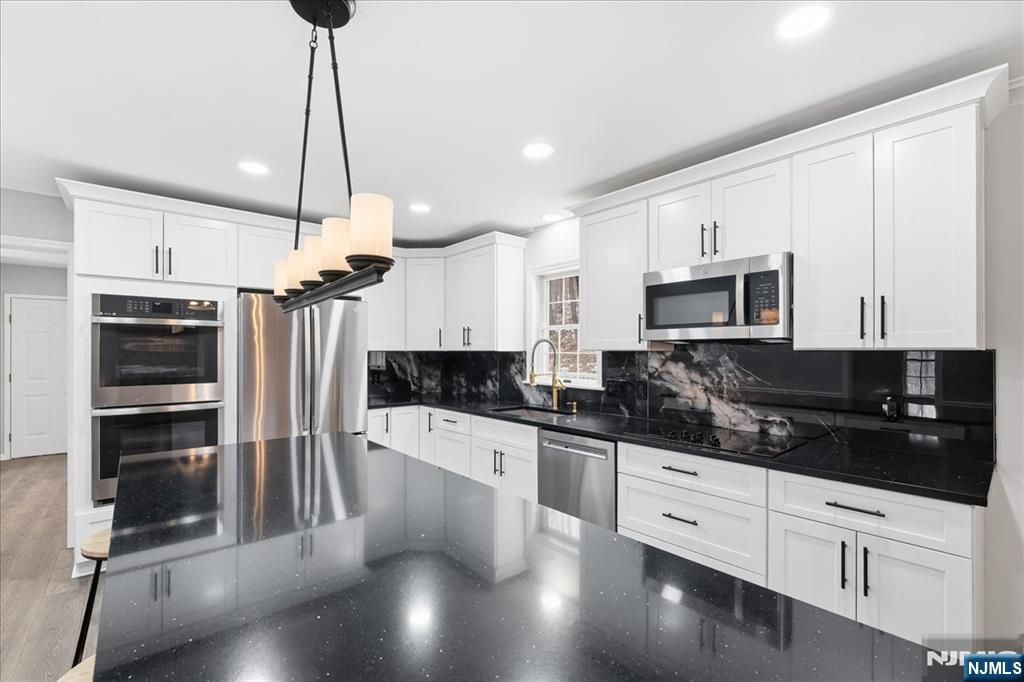 Photo of 611 Snake Den Road, West Milford, NJ 07480 (MLS # 25042749)