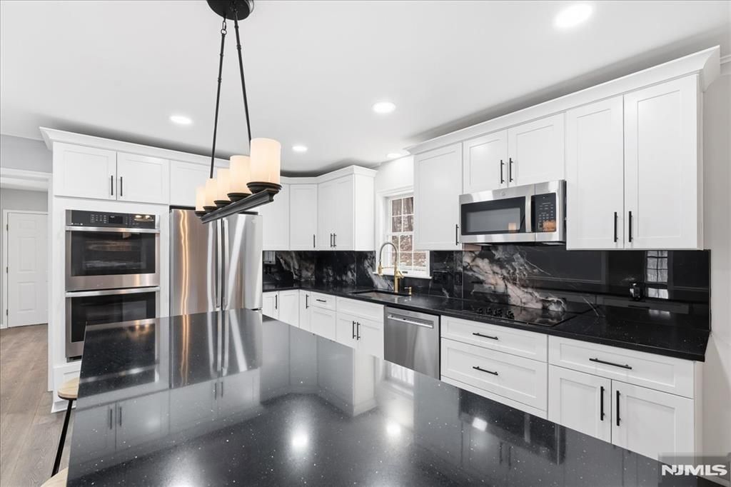 Photo of 611 Snake Den Road, West Milford, NJ 07480 (MLS # 25042749)