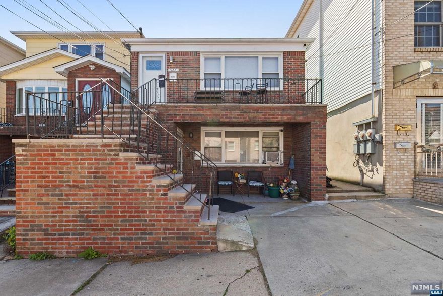 Welcome to this wonderful income generating 2-family home in the flourishing Jersey City Heights. This spacious property features 5 beds, 2.5 baths, and recent updates to both units, including renovated baths & kitchens. With large rooms, a lovely backyard space and a charming front porch, it offers an inviting living experience. Hardwood floors top unit & new vinyl plank bottom unit. Priced attractively for investors or owner occupants, it generates approx. $5,000 per month in rental income for good cash flow or to offset the mortgage costs. Commuters will love the convenient access to Routes 1&9, NYC buses, Light Rail, Hoboken train station & PATH which are all only minutes away! Enjoy the vibrant Heights downtown area on Central Ave or the allure of Washington Ave in Hoboken w/ its abundance of shops, bars & restaurants. Don't miss out on this great investment opportunity! All of the interior photos are virtually staged since there are tenants currently living in both units.