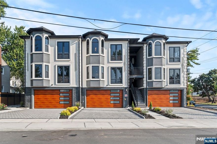 Welcome to this stunning brand-new 2-bedroom, 2-bath rental in Bergenfield. Be the first to enjoy modern living with stylish finishes and a thoughtfully designed layout. The bright and airy open-concept living and dining area is ideal for both everyday living and entertaining, seamlessly connecting to the sleek kitchen featuring stone countertops, stainless steel appliances, and a breakfast bar. Both bedrooms are generously sized with excellent closet space, while the two full bathrooms are beautifully appointed with modern tile work, vanities, and fixtures. Convenience is at your fingertips with in-unit laundry, and two tandem off-street parking spaces are included. Water is covered in the rent; tenants are responsible for electricity, gas, and cable. Set in a prime Bergenfield location, this home offers easy access to shopping, dining, schools, and multiple transportation options, making commuting simple. Enjoy the comfort and efficiency of brand-new construction in a home that checks every box.