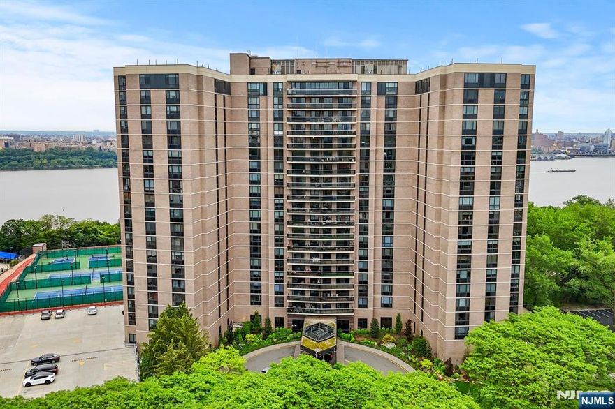 Welcome to luxury living at the Atrium Palace in Fort Lee, just moments from the heart of New York City. This exclusive 18th-floor J-line condo offers a perfect blend of style, comfort, and high-end amenities. Featuring 3 bedrooms and 3 full bathrooms, this spacious residence is thoughtfully designed with premium touches including a private built-in sauna, walk-in closet, marble floors, custom kitchen cabinetry, and rich cherry wood doors. Enjoy a warm and inviting living area complete with a fireplace, a sleek bar setup, and motorized blinds. Step out onto the expansive wrap-around terrace and take in breathtaking panoramic views of Manhattan, the Hudson River, and the George Washington Bridge. Two deeded parking spaces are included. Come see why this impressive condo defines refined livingâ€”your luxurious new home awaits.