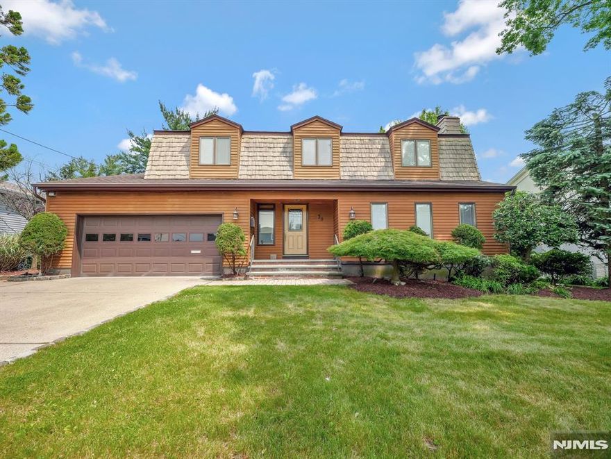 Nestled in a serene, sought-after neighborhood. As you approach, the manicured lawn and vibrant landscaping welcome you home. The classic exterior, adorned with tasteful accents, hints at the timeless elegance within.Step inside to discover a spacious and inviting interior with a large living room, complete with a fireplace. The heart of the home is the gourmet kitchen, featuring custom appliances, and ample cabinet space. Whether preparing a casual meal or hosting a dinner party, this culinary haven caters to every need. Adjacent to the kitchen is the cozy family room, perfect for gathering with loved ones on chilly evenings.Upstairs, the tranquil master suite awaits, boasting a generous layout, walk-in closet, and a spa-like ensuite bathroom with dual vanities, soaking tub, and separate shower. Three additional bedrooms offer plenty of space for family members or guests, each thoughtfully designed for comfort and style. laundry room, attached car garage and central AC.