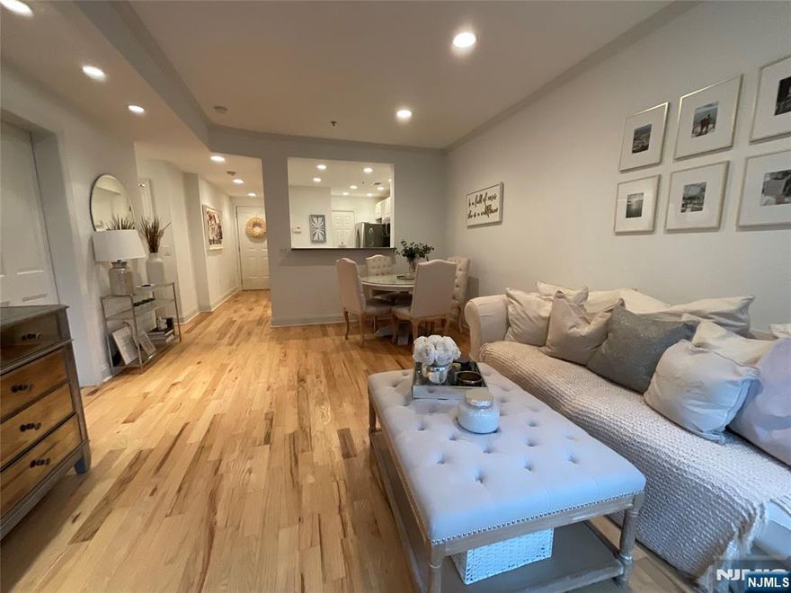 Nicely updated One bedroom apartment at The Columbus with over 800 sq ft of living space! This apartment features an open floor plan with hardwood floors through out and central air. An updated kitchen with stainless steel appliances, a spacious pantry, and a breakfast bar. It offers a spacious living room with enough space for a dining area. This apartment offers a unique private terrace to enjoy through out the year. The main bedroom is spacious enough for a king size bed and offers 2 large double closets. There is an updated bathroom with plenty of storage. The apartment also features a washer and dryer in the unit and plenty of additional closet space. Included in the rent is an indoor assigned garage space (#78), access to gym, and an elevator. The building offers bike storage if needed for an additional cost. Available starting June 1.