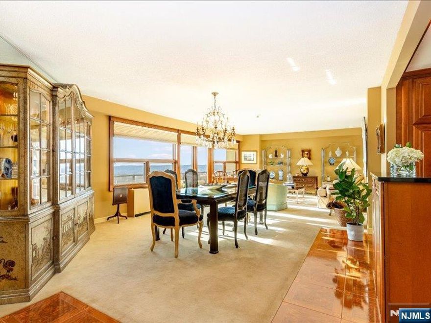 Enjoy a life of quiet luxury and effortless convenience at The Claridge, one of Essex County's premier full-service high-rise communities! This elegant one Bedroom residence on the 8th floor offers an open-concept layout with Chef's Kitchen, premium finishes and a spacious Living/Dining room with access to a private balcony. The generously sized Bedroom features a luxurious ensuite Bath with two walk-in closets, tub shower and vanity. Additional highlights include abundant natural light from oversized windows, beautiful parquet floors, a chic Foyer with Powder Room, in-unit stackable Washer/Dryer and a storage locker conveniently located on the same floor. Residents enjoy full-service amenities, including 24/7 doorman and valet, heated outdoor pool with picnic/BBQ area, putting green, tennis and pickleball courts, fitness center with sauna, library and multiple party rooms. Easy access to major highways and just five minutes to Montclair's museum, shops and dining. Monthly maintenance includes heat, water, electricity and full use of all amenities.