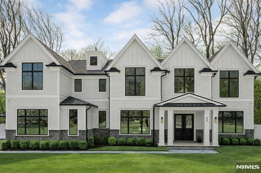 Spectacular New Construction built by premier builder Rock Solid. Situated on a perfect lot, this extraordinary home offers 6 ensuite BRs & 7.5 BA across approx 8,900+ sq ft on 3 levels, timeless elegance w/ modern luxury at every turn. Enter to a 2-story foyer flanked by inviting living w/ paneled walls & a banquet size dining rm w/ coffered ceiling. The perfect open floor plan that boasts a family rm w/ custom built-ins & fireplace. A dream kitchen w/ two waterfall islands, top-of-the-line Sub-Zero, Wolf, Cove appliances, & breakfast area with views. A 1st floor BR, full bath w/ access to rear yard & mudroom. The 2nd floor offers a loft area & 5 luxurious en-suite bedrooms w/ custom closets. A stunning primary suite w/ dual walk-in closets, a spa bath with oversized shower, soaking tub & separate vanities. Large laundry room w/ double washers & dryers. The outdoors is exceptional, designed for year-round enjoyment, featuring a covered outdoor living space with FP, outdoor kitchen, and custom gunite pool w/spa overlooking the pristine, level fenced in yard. The lower lvl is an entertainerâ€™s dream, offers a custom wet bar, recreation space, home gym, movie theater w/ 7 theater chairs & equipment, bonus room, & full bath. A 3-car garage, generator, integrated sound system, custom lighting, extensive landscaping, security system w/ cameras & countless thoughtful upgrades throughout. A truly exceptional offeringâ€”where luxury, comfort, and lifestyle come together seamlessly.