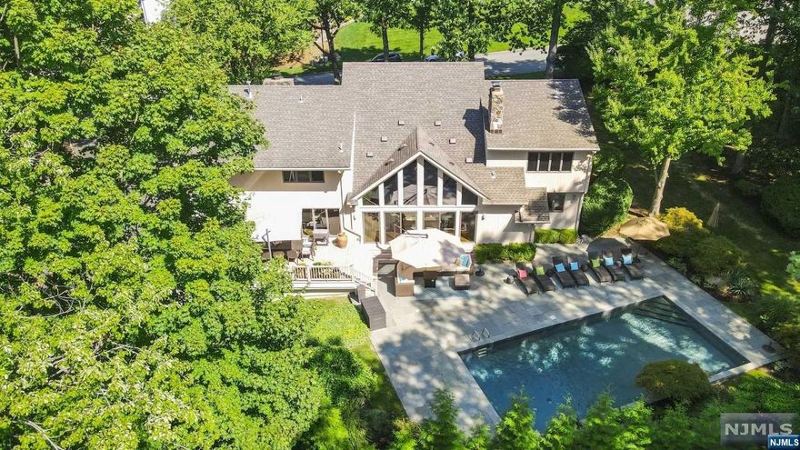 Luxurious & newly renovated contemporary home nestled on private cul de sac in Rio Vista Cresskill. Wind down in the breathtaking bckyrd w/newly renovated Hamptons style pool & patio+Outside 1/2 bth. A spectacular 2 story entry opens to a great rm w/soaring ceilings,enhanced by new flr to ceiling windows. A 2018 showstopper Kuche&Cucina kitchen w/quartzite countertops & high end SS appliances transitions to an expansive deck creating a seamless flow between inside & out. The open floor plan incl a lovely bkfst area, comfortable fam. rm & fpl. An entertainer's dream; Dining Rm & Great Rm w/FPL are sensational. 2 spacious bdrms, 1/2 bth & updated full bth also on 1st lvl. A dramatic 2nd flr catwalk overlooks the sun drenched 1st flr;primary bdrm suite ftrs 2 lrg WIC's & partially updated generous bth. 2 addt'l bdrms & full bth complement the 2nd lvl. The LL ftrs a lrg rec rm,lndry,wine cellar, ensuite bdrm w/private access from driveway & storage. A 3 Car, garage.8 miles from NYC.