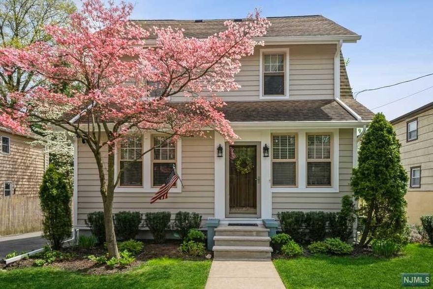 Welcome home to this well loved and cared for colonial in Cresskill! Move-in ready, featuring new windows, new water heater and heating unit with 5 zones, whole house generator, gutter guards, new siding and so much more! At entrance, the home features a welcoming custom foyer perfect for storage and shoes. Walk through to the living room, boasting beautiful hardwood floors and bright windows. French doors lead into the dining room/kitchen with SS appliances, and a newly renovated master bedroom with full bath, and sliding glass doors to deck complete this first level. Stairs lead up to the second floor, featuring 2 bedrooms and a full bath. A finished attic and finished basement complete this wonderful home that could be yours! 2 car detached garage, professionally landscaped property, new fences, close proximity to all recreational activities, schools, restaurants, transportation and houses of worship.