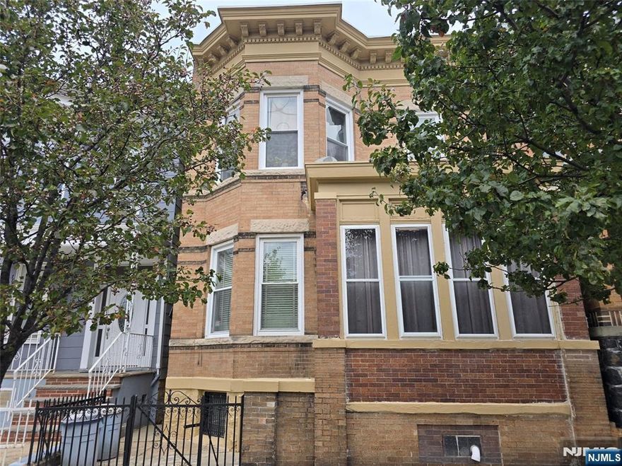 Well-Maintained Two-Family Home in Prime Union City Location. This spacious and lovingly cared-for two-family residence offers exceptional convenience and versatility. Ideally situated near major transportation, schools, shopping, houses of worship, and highways, this location is truly unbeatable. Each unit features: 3 generously sized rooms, full bathroom, living room, eat-in kitchen. The first-floor unit and finished basement enjoy direct access to a charming backyard with a patio and dedicated gardening space, perfect for outdoor relaxation or entertaining. The second-floor unit offers a bonus room and washer hook-up. Additional highlights include separate cooking gas and electric utilities, finished basement with flexible use potential. Move-in ready condition. This unique opportunity wonâ€™t last longâ€”schedule your showing today!