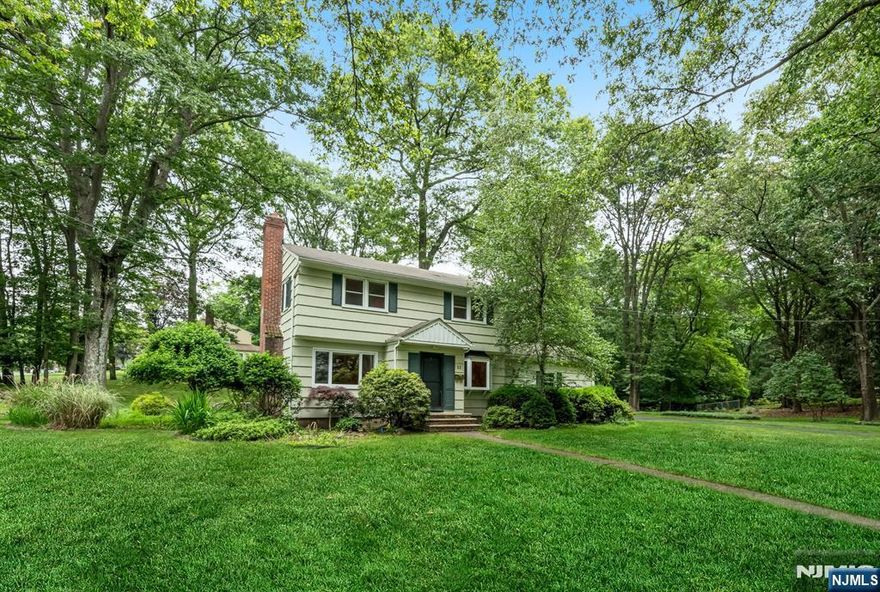 Endless possibilities await on this prime corner lot in a peaceful neighborhood. Set on .83 acres (173' x 209'), this home is ready for its next chapter. Whether you're a builder, investor, or end user, this 3-bedroom colonial offers tremendous potential to renovate or build the home of your dreams. Spacious 1st floor with a living room, dining room and eat-in kitchen with nearby powder room and access to the large deck overlooking the parklike property. Upstairs are 3 generous sized bedrooms and an airy open landing, perfect for an office or play area. A partially finished basement adds additional living space. A rare opportunity on a beautiful, level lot in a sought-after location. Donâ€™t miss this chance to create something special!