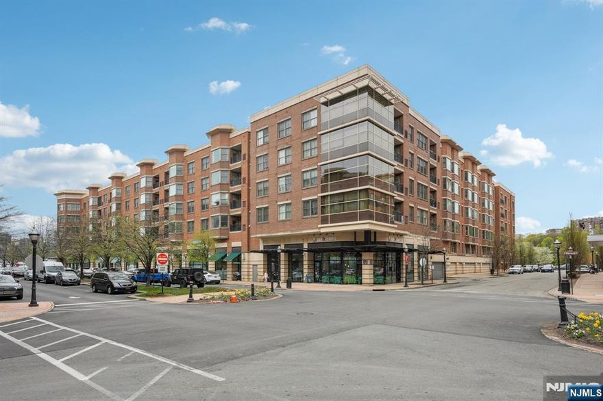 This pristine 923 sqft 1-bedroom, 1-bathroom residence at the highly sought-after Grandview at Riverwalk offers 9-feet ceilings, hardwood floors throughout, and a charming Juliette balcony. The kitchen features stainless steel appliances, granite countertops, and a spacious island. The oversized bathroom boasts a jetted jacuzzi tub and a separate stall shower. Building amenities include a 24-hour doorman, fitness center, renovated courtyard with BBQ area, an outdoor pool, One covered parking space #149. ACME supermarket, coffee shops and restaurants within walking distance. A commuter's dream ideally located near the NY Waterway Ferry, NJ Transit bus a block away and Hudson-Bergen Light Rail. Don't miss it!