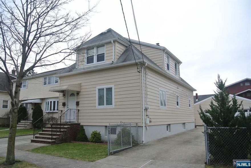 Well maintained property with 2 car garage detached and planty of parking spaces. First floor consists living/dining room, newer kitchen, 2 bedrooms, full bath. Recent renovation included new plumbing, new electric, hardwood floor, central air. 2nd floor is very clean with separate entrance, living room, eat-in-kitchen, full bath, 1 bedroom. The basement is full unfinished with new electrical panel, laundry, 2 furnaces, 2 hot water heaters, 2 eletric meters. Owner entrance in the back of the house. Great backyard for gardening. Coveniently located, close to NYC transportation.