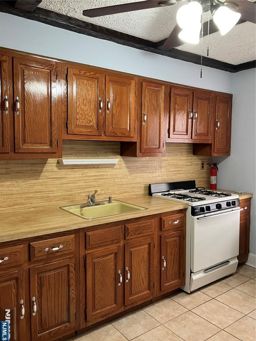 Charming 2nd floor apt. in 2 family house in convenient location. Tenant pays electric and cooking gas. No laundry on premises. Pet may be considered.