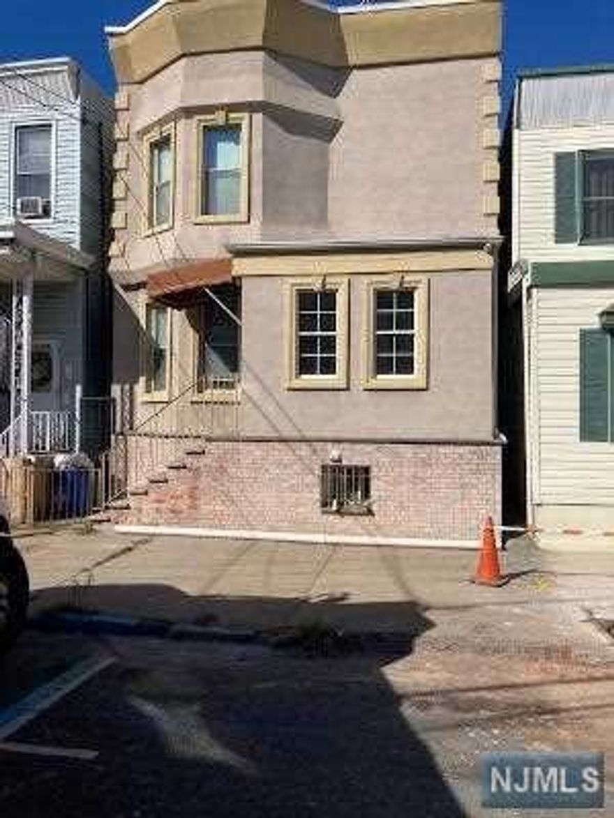 Recently renovated two family home, 2 blocks from light rail. Finished basement, close to parks, transportation, schools and shopping.