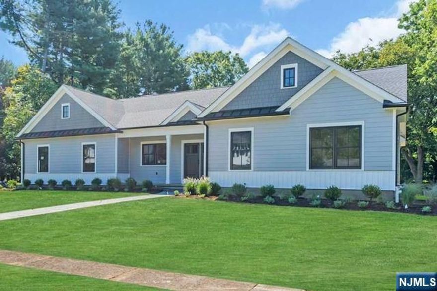 Discover a custom-built 2600 sq ft. ranch home, now available due to a change in the owner's plans. This beautifully designed, open-concept home features soaring ceilings in the kitchen and great room, and 9-ft ceilings in the dining room and bedrooms. Extra-wide doors throughout enhance the home's spacious feel and accessibility. Boasting 3 bedrooms, 2 full baths, and a powder room, this home is built for comfort. The kitchen is a showstopper with top-tier custom cabinetry, a walk-in pantry, and a layout perfect for entertaining. A separate office adds to the functionality. The exterior is maintenance-free with Hardie board siding, and the property includes a 2-car garage and an unfinished full basement. Situated on a large, flat lot in one of Old Tappan's most prestigious neighborhoods, this home offers both privacy and luxury. Completion is just around the corner, so take advantage of this unique opportunity to make it yours and start your next chapter in a brand-new, custom ho