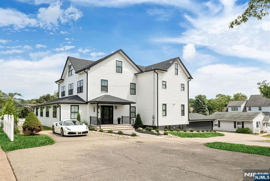 Welcome to this newly renovated 7 bedroom, 5.5 bath luxury estate in Wayne, NJ. Spanning 3 finished levels, the main floor offers an open layout with a gourmet kitchen, dining area, living room with fireplace, office, and 2 bedrooms. Upstairs, the primary suite features 2 custom closets and a spa-like bath, along with 2 en suite bedrooms and a laundry room. The top floor includes a living area, 2 bedrooms, and full bath. Set on a large lot with an in-ground pool and private backyard, the property also includes a renovated guest home currently rented, offering excellent income potential.